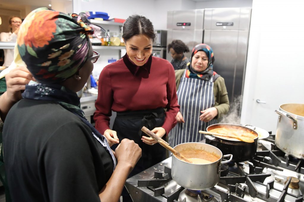 The Duchess of Sussex during a visit visit the Hubb Community Kitchen