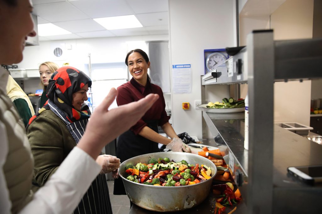 Meghan Markle cooking at the Hubb Community Kitchen