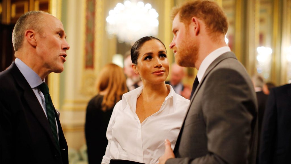 Meghan Markle looking at harry Endeavour Fund Award